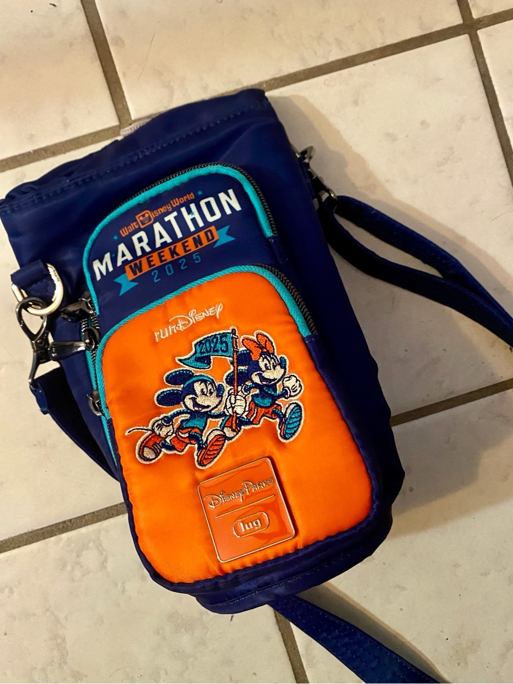 lug Navy and Orange Marathon Weekend 2025 Crossbody Water Bottle Bag